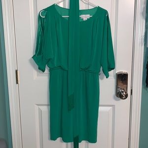 New Jessica Simpson, Emerald colored dress with peek a boo opening in sleeves.